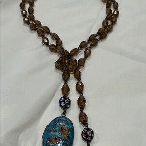 Saint Vintage Brown Beaded Necklace with Blue Locket Pendant